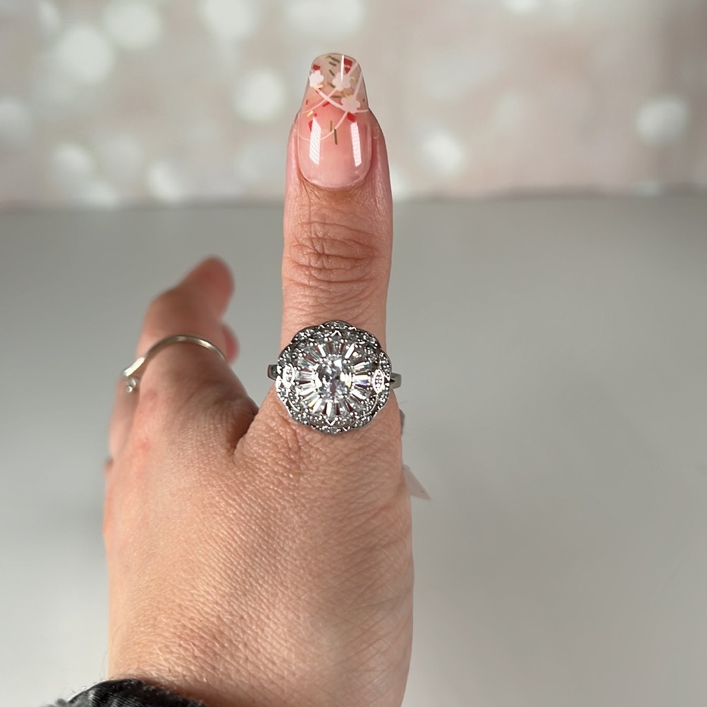 BELLA LUCE 3.66 CTW White Diamond Simulant Rhodium Over Sterling